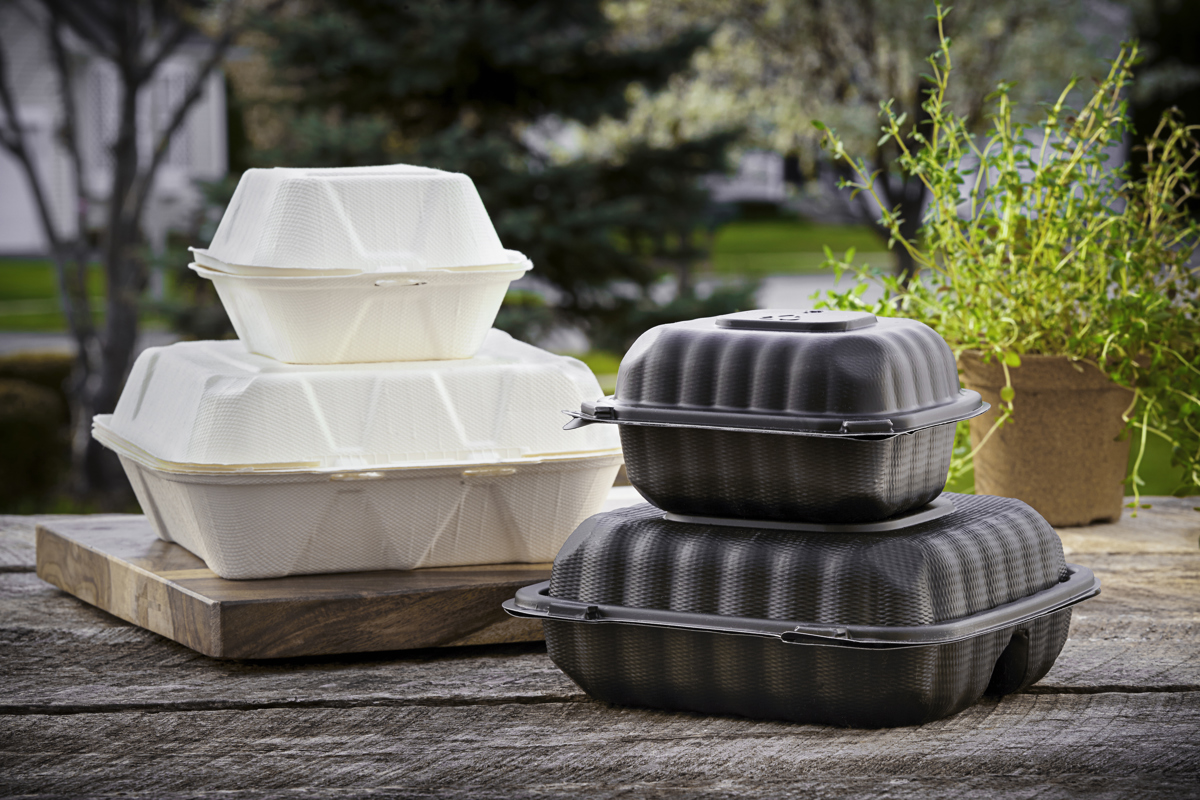 two different size white take out containers stacked on top of each other and two black different size takeout containers stacked on top of each other	