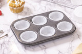 liners for cupcakes or muffins inside of a tray