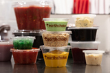 variety of round takeout containers for soups and dips