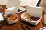 variety of take out containers on a desk