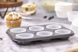 liners for cupcakes or muffins inside of a tray