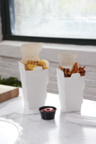 french fry containers with french fries inside