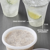 clear cold beverage cup with ice water inside	