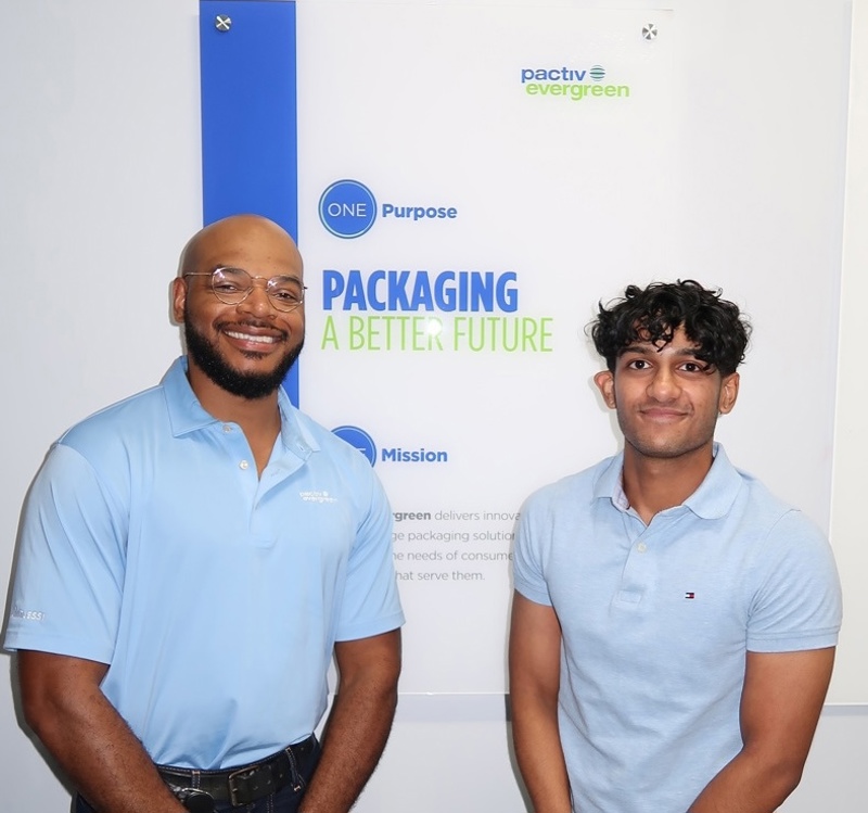 A male intern and his male mentor standing next to each other during Pactiv Evergreen's internship program