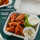 spicy chicken wings in a takeout container with celery and portion cups for ranch and blue cheese crumbles	