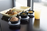 small round dressing containers