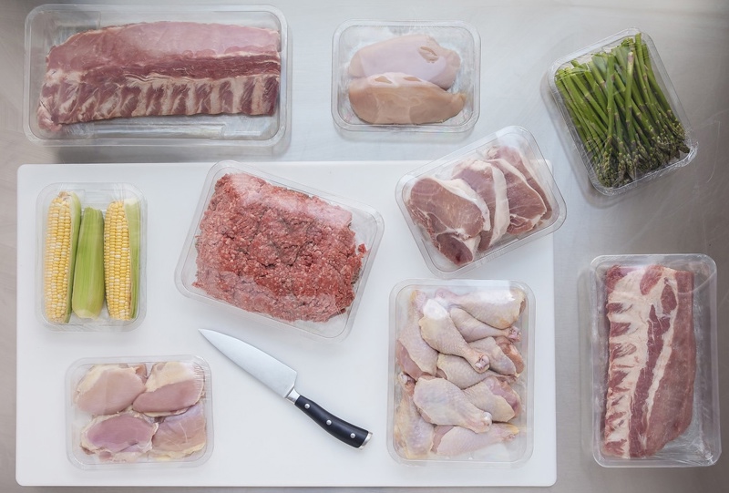 Raw meat in clear meat trays with clear Reynolon film